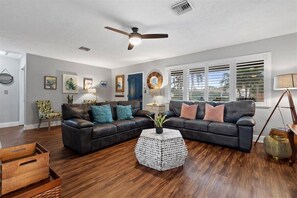 Wind down and catch up on your favorite TV shows in the spacious living room, or play some board games.