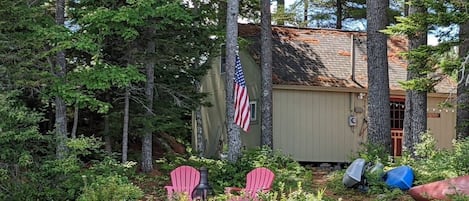 Small Maine beach, Kayaks and Canoes for your use.