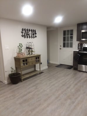 Kitchen creadenza and front door to cottage