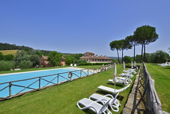 The property surrounding by greenery and the sharing pool