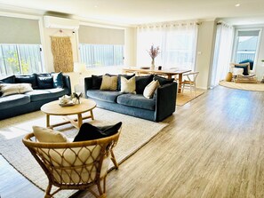 Living area connecting to dining