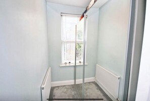 Large walk-in mirrored wardrobe