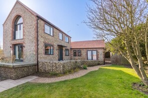 Anchorage, Salthouse: Front elevation looking over the marsh