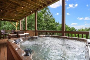 Enjoy a soak in out hot tub on the lower deck