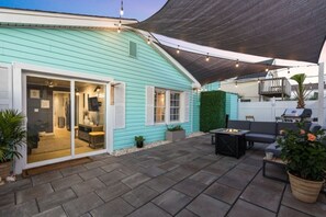 Have a BBQ, in this picture perfect back yard. 