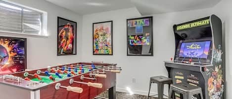Gameroom with foosball and arcade