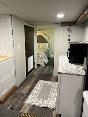 Kitchenette and bed area
