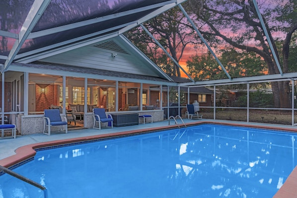 Relax through the warm days of the summer with a screened in, private pool
