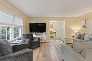 65 inch smart TV with plenty of seating for a movie or a game