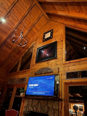 Fine Artwork and Hotel Clock up above fireplace in Living Room on Main Floor 