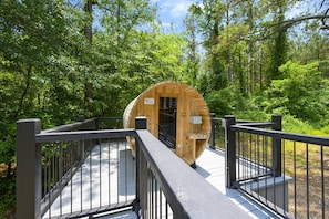 "Detox and de-stress in our cabin's private sauna, a haven of warmth and wellness for all our guests."
