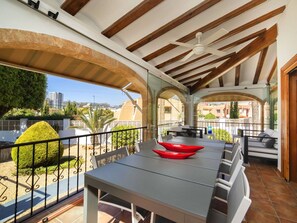 Table, Furniture, Plant, Shade, Porch, Building, Wood, Lighting, Interior Design, Chair