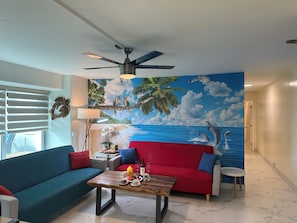 Living room has two Sofa beds
