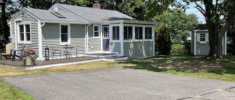 Front of home with two car driveway.