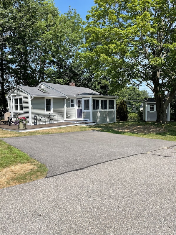 Front of home with two car driveway.