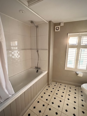 Bathroom on top floor next to twin bedroom