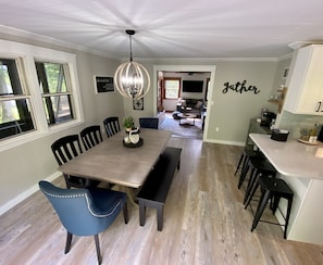 Dining room with plenty of seating right off the fully equipped kitchen