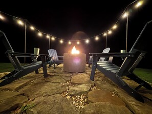 Finish your long day relaxing by the private firepit and watching the stars!
