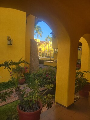 Steps and archways to your apartment in paradise