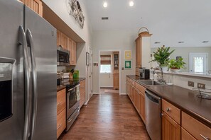 Main level kitchen.  First floor has a second kitchen area with a refrigerator