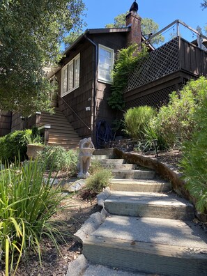 Quaint walkway to front door.