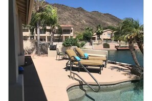 Relax in style next toLake and heated Pool