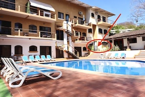 Our unit (circled) is in gated complex with large pool & lots of lounge chairs
