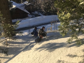 My friends and I lugging our stuff through a few feet of snow. Tough girls only!