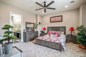Primary Suite with a King bed, sitting area & coffee bar