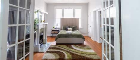 Queen bedroom with desk.