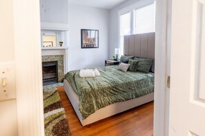 Queen bedroom with desk.