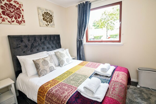 Bedroom 1 with amenities