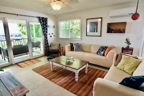 Living room with beautiful Pearl Harbor view from the lanai