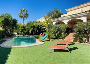 Sun beds around the pool