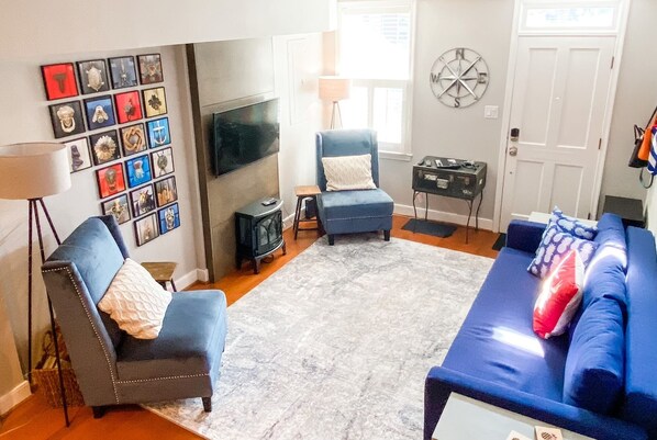 Living room set up for conversation or watching tv. 