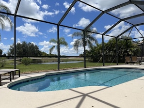 Screen in pool and patio overlooking golf course 