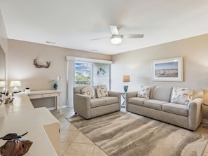 Living Room with Balcony Access at 1741 Bluff Villa