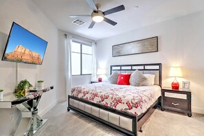 Enjoy a restful night in a serene bedroom featuring a comfortable queen bed and soft linens.