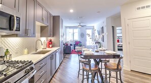 Cook with ease in a fully equipped kitchen stocked with modern appliances and essentials.