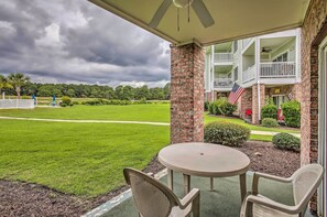 Private Patio | Outdoor Dining Area | Pool Views | 1st-Floor Unit