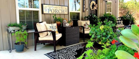 A porch built for relaxing and enjoying family & friends!