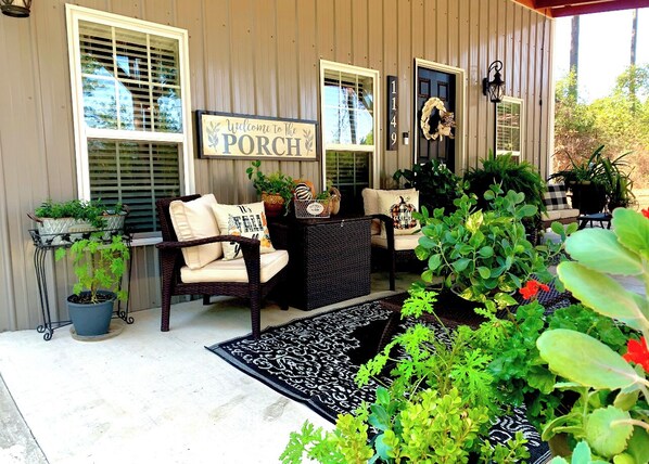 A porch built for relaxing and enjoying family & friends!