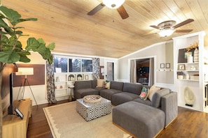 Larger groups can sleep additional guests in the cozy living room. The sofa/sectional and an air mattress can also be placed in the living room.