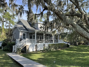 Rear screened porch and backyard