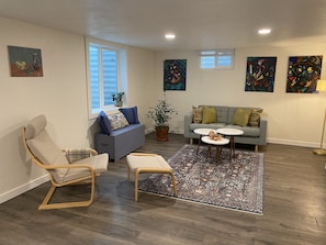 The cozy living space perfect for enjoying the natural afternoon light coming in
