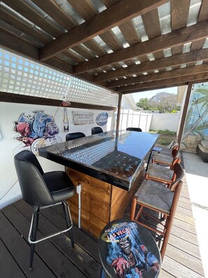 Outside Covered Bar Area with Big Screen TV.