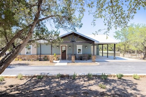 Charming House with a Front Porch and  Carport