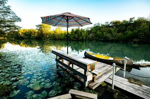 Only property with a deck to access the river and enjoy fishing from