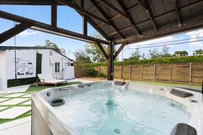 Hot Springs Jacuzzi purchased and installed 2021. Can comfortably fit 6 people but we have had 8 in there as well! 