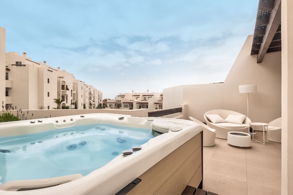 Rooftop jacuzzi with chill out area